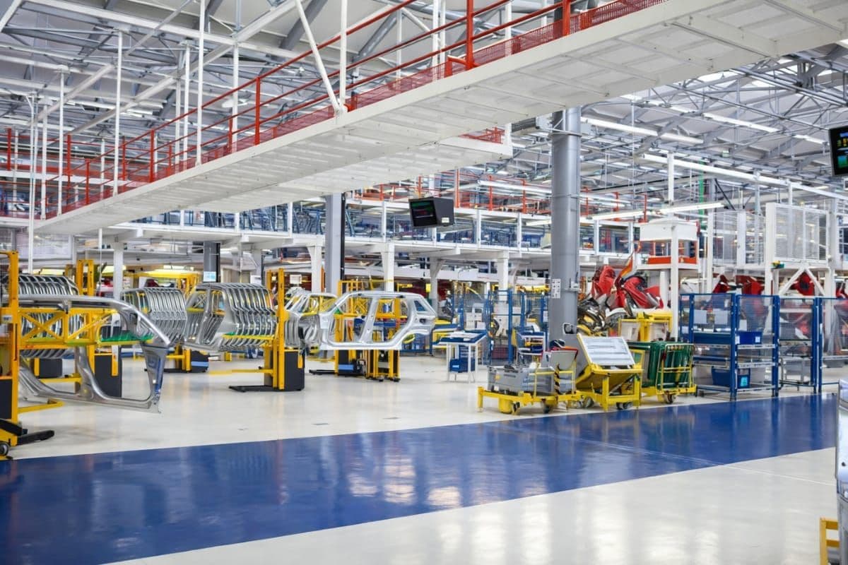 Industrial manufacturing plant with heavy equipment and power distribution systems